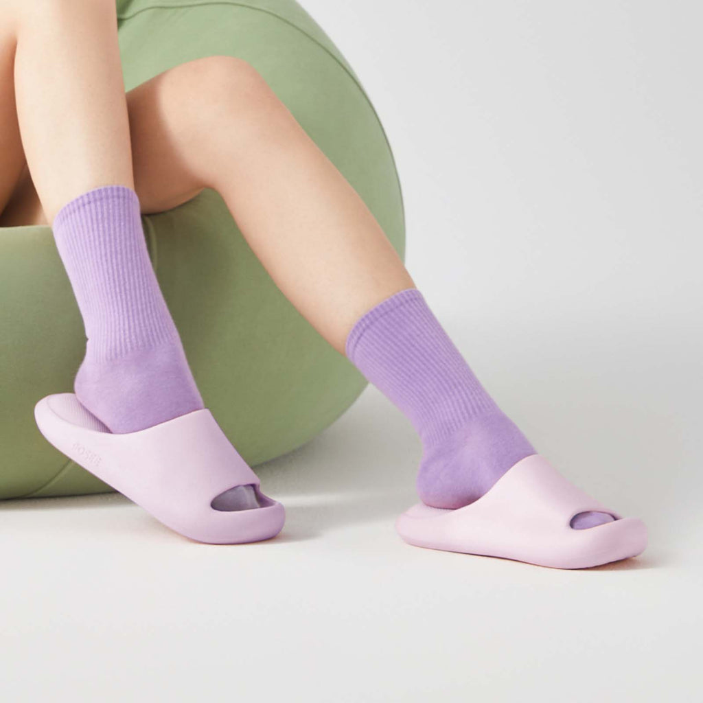 Purple indoor pillow slides in stores